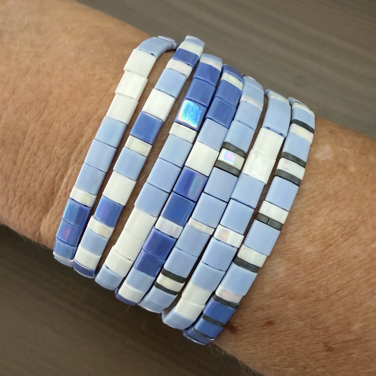 Periwinkle tila women's bracelets stacked on a wrist