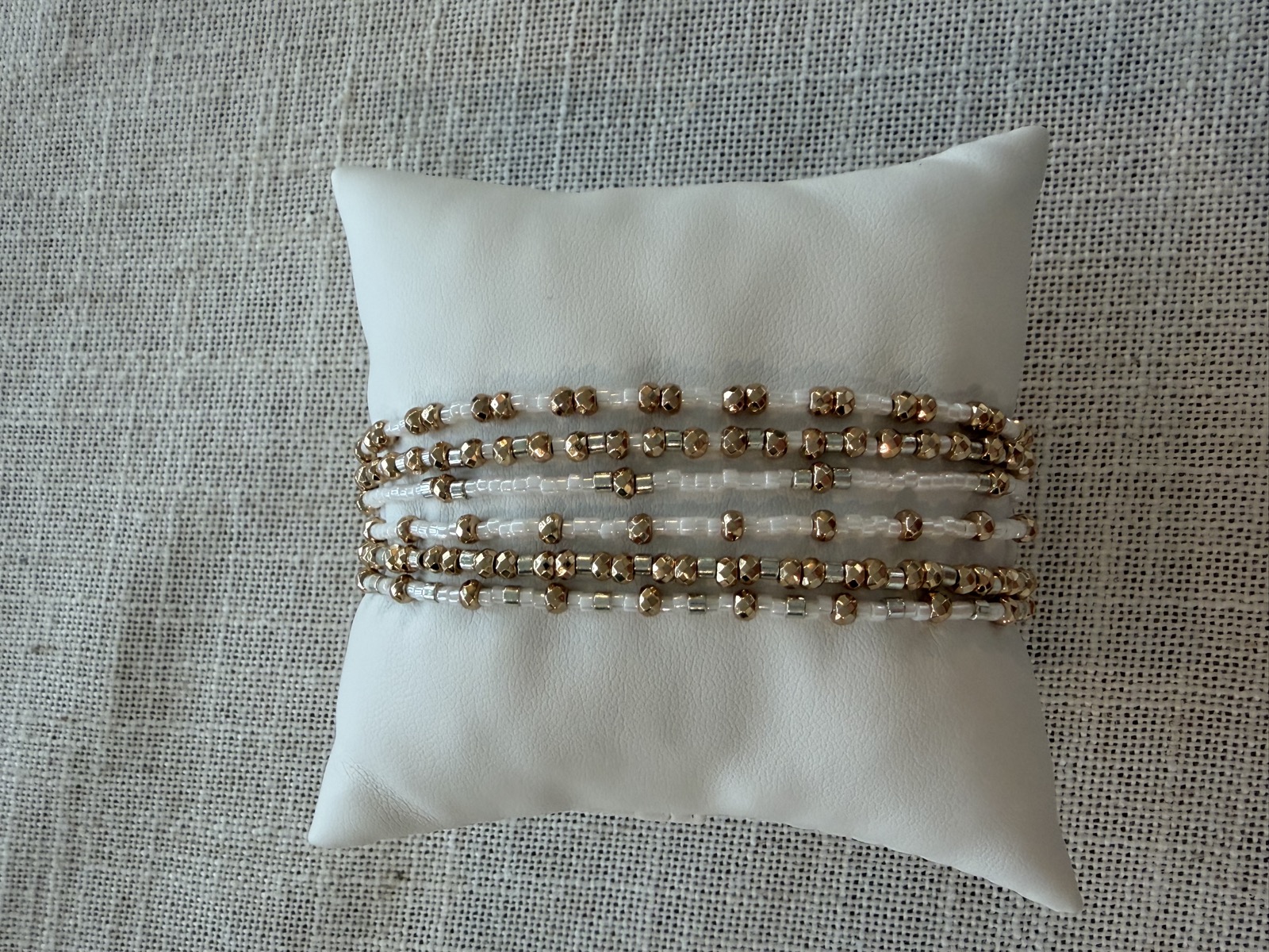 Gold and pearl stacked women's bracelets